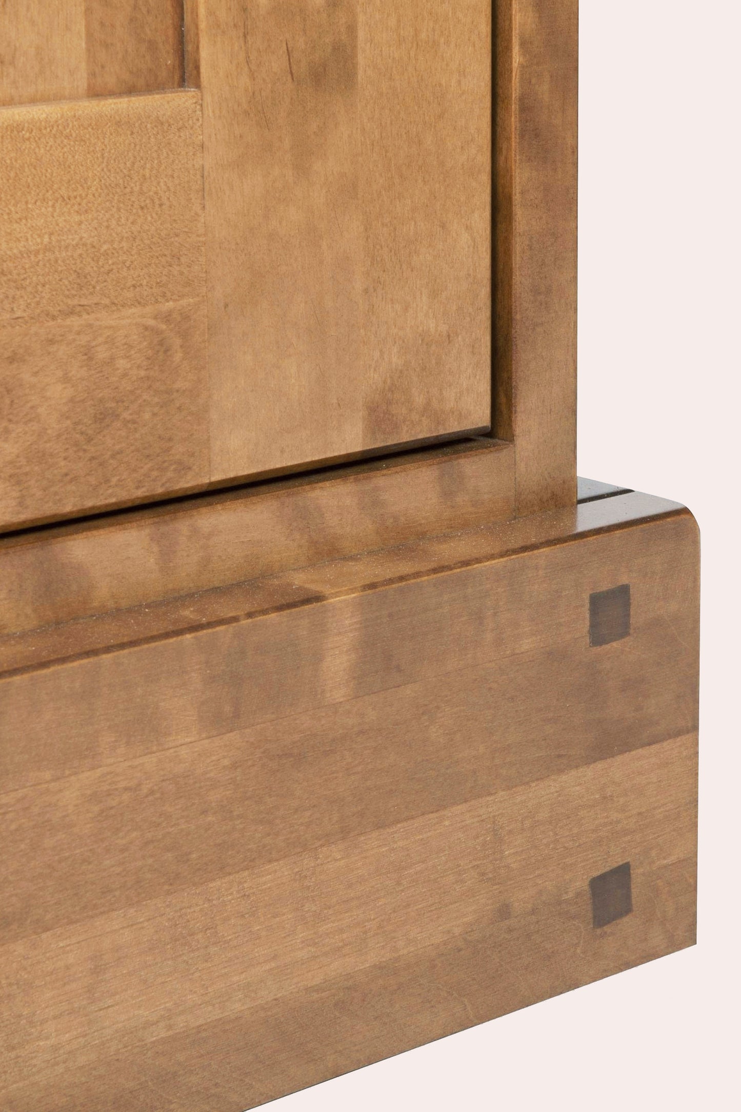 Close-up of a wooden door corner of of a sideboard