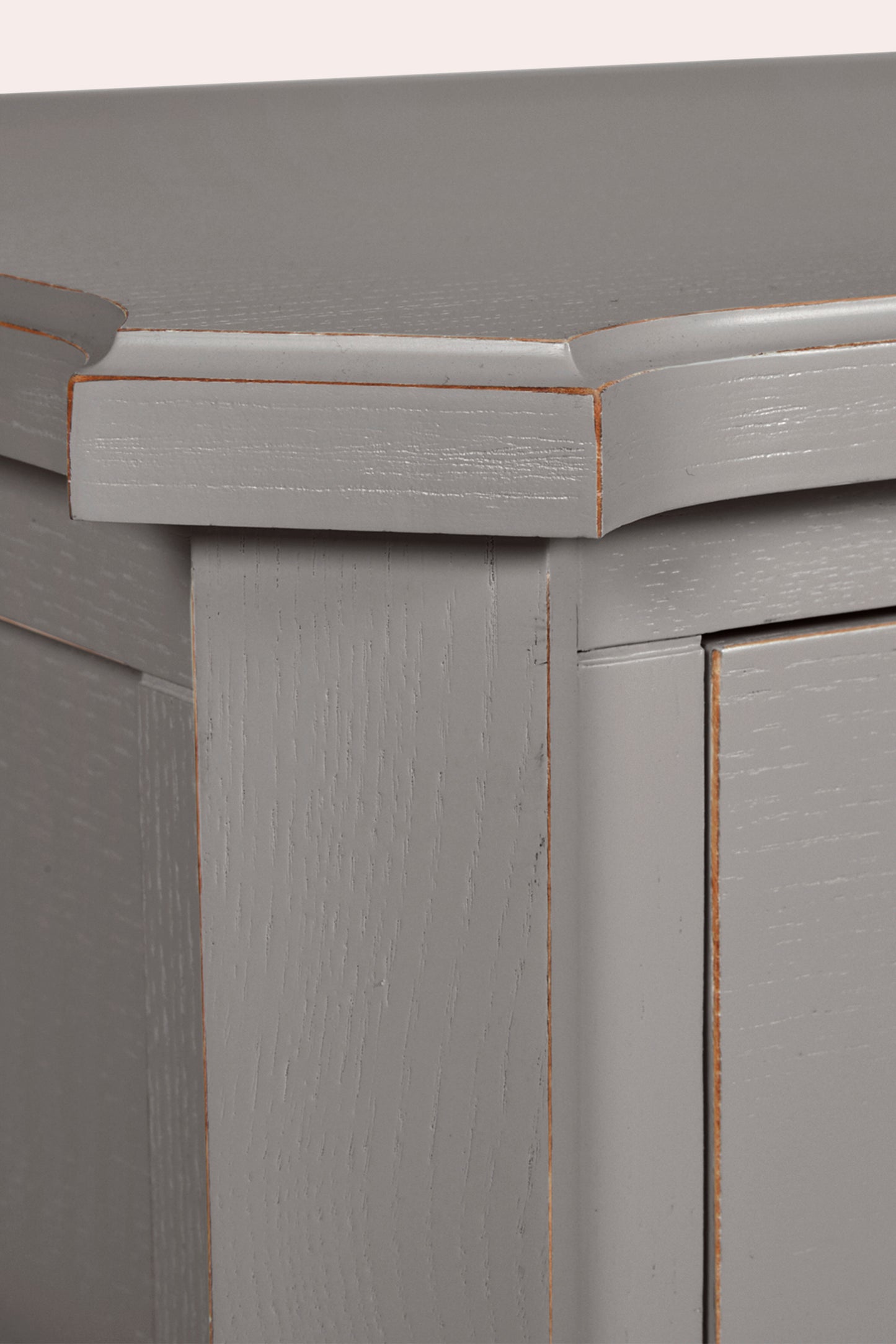 Close-up of a gray wooden cabinet with a smooth finish