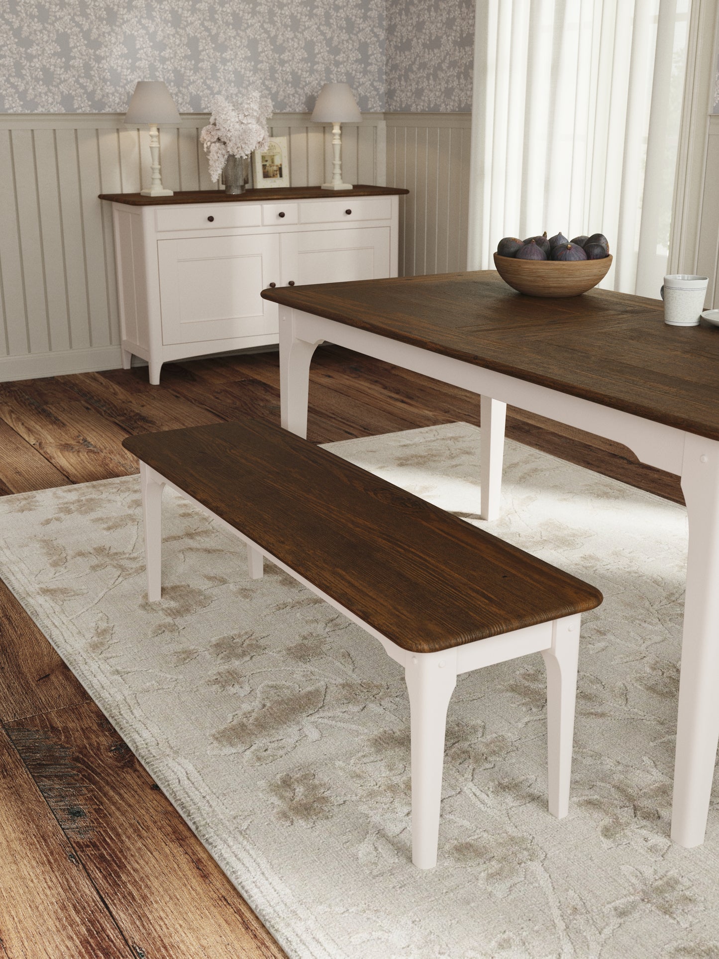Dining room with wooden table and bench on a patterned rug