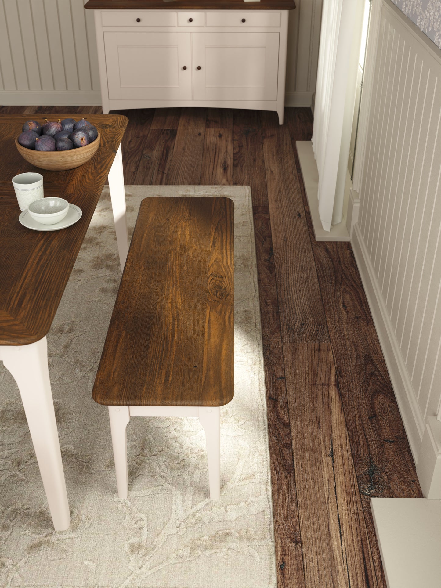 Wooden bench in a room with a wooden floor and white walls.
