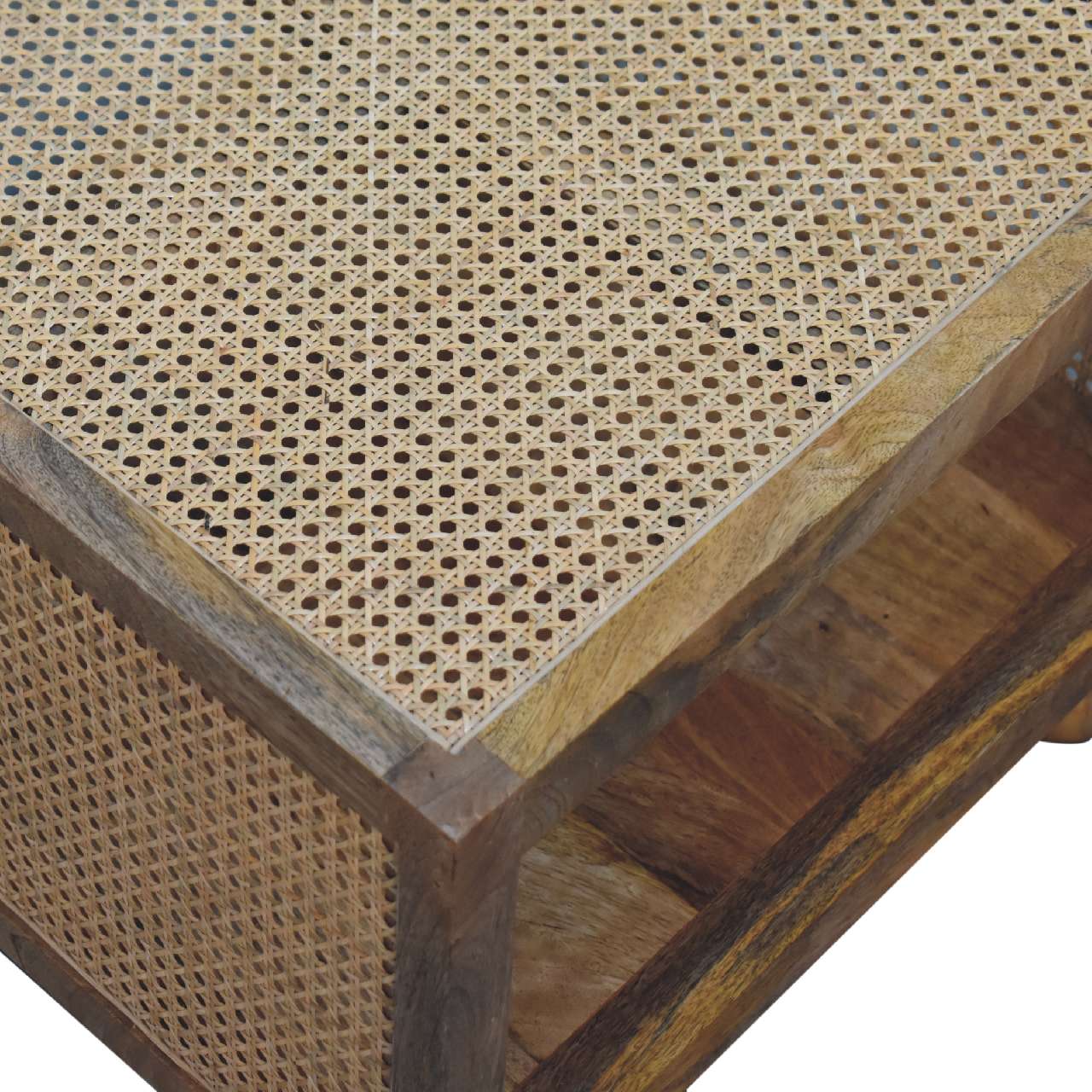 Close-up of the woven rattan panel on the side of a square wooden coffee table, showing the detailed texture.