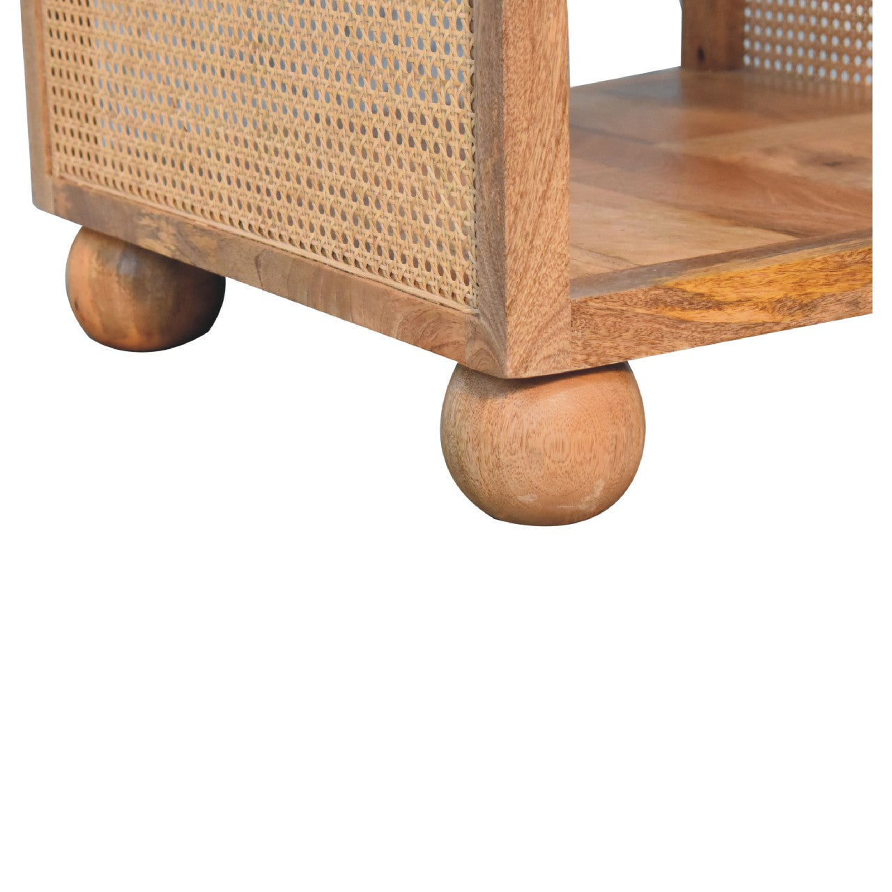 Detailed view of a spherical wooden leg supporting a square rattan coffee table, highlighting the rounded ball design.