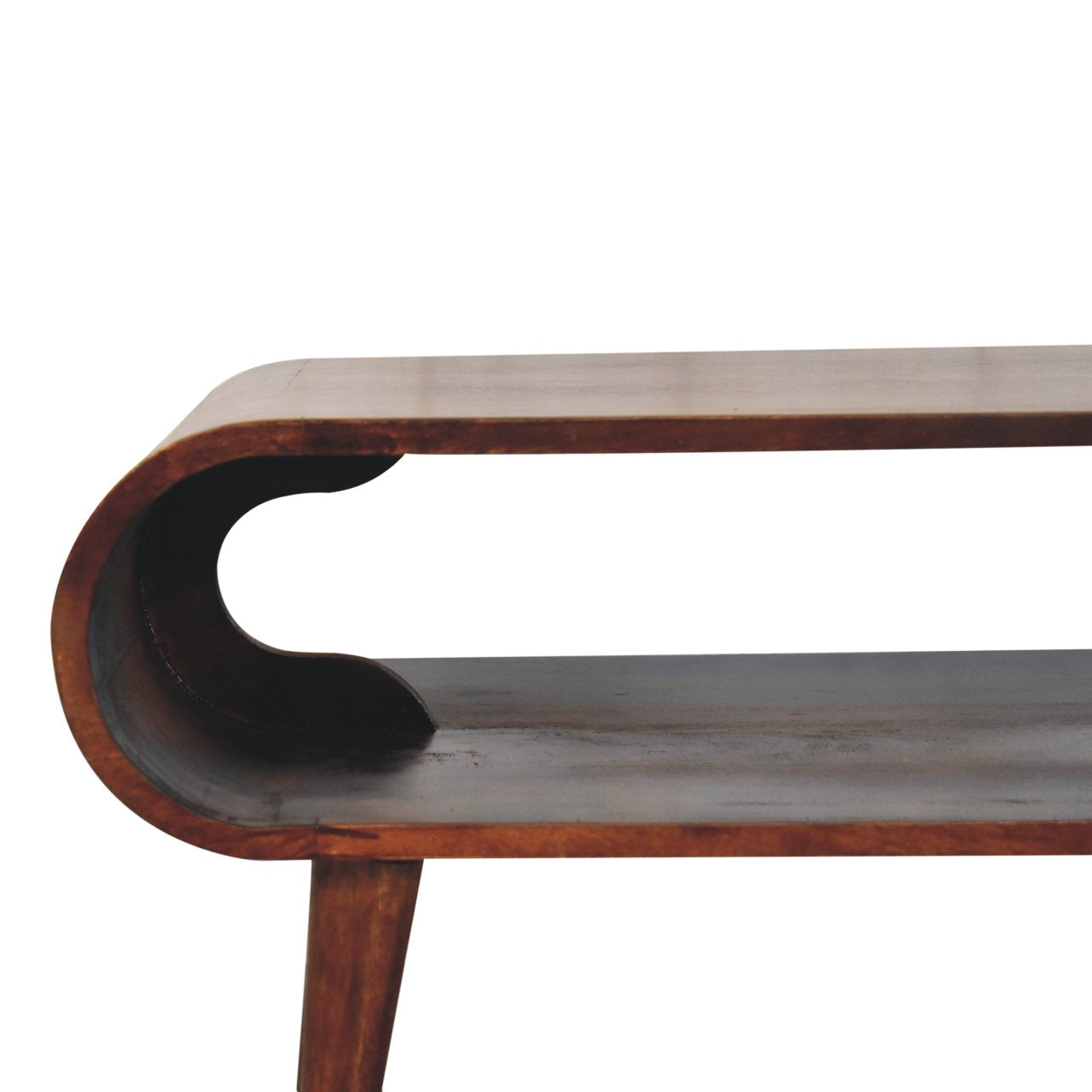 close up of left side of oval coffee table with 4 legs on a white background