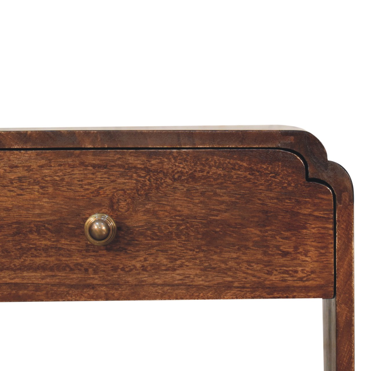 Close-up of the single drawer with rounded brass knob and curved edging design.