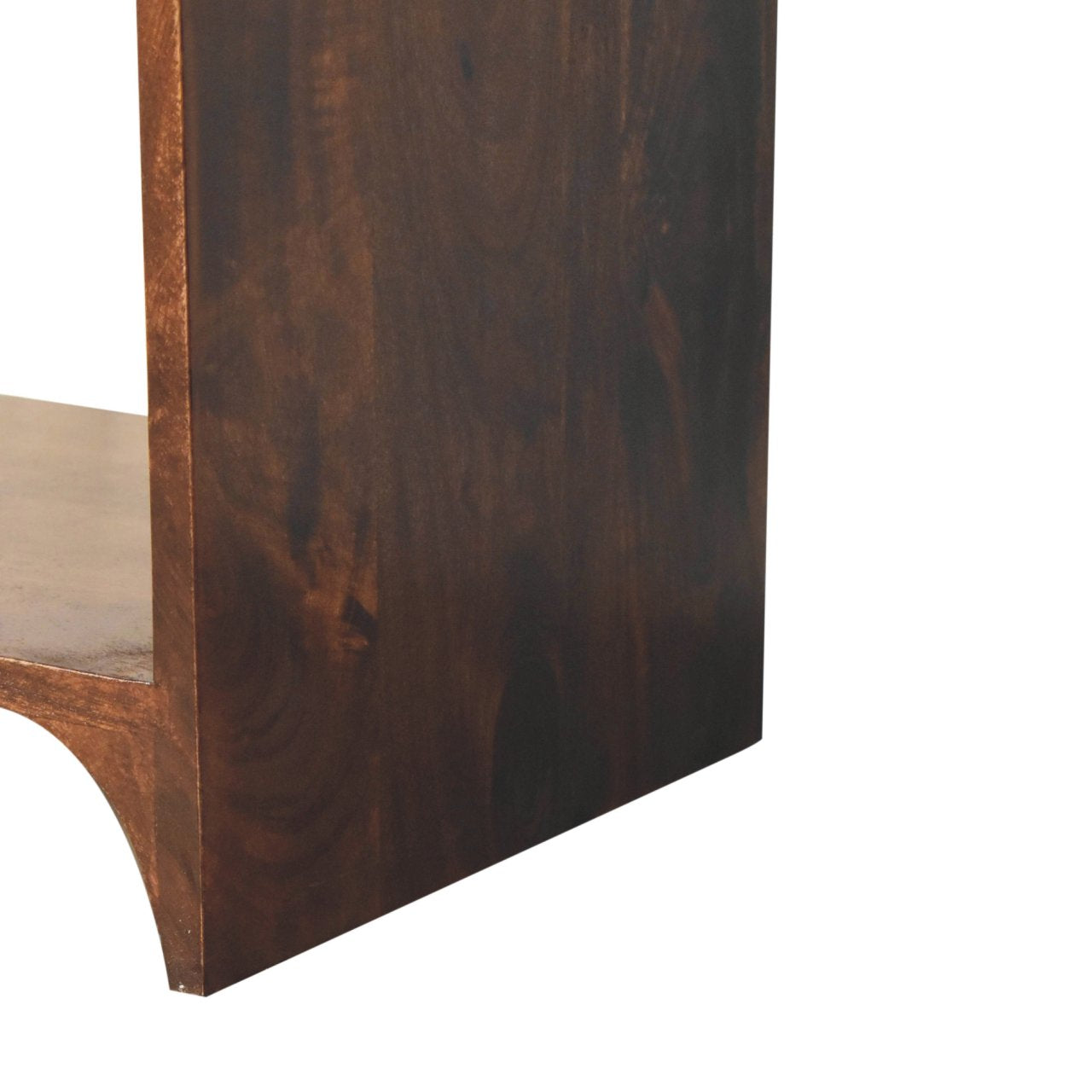 Close-up of the carved leg openings with smooth, curved cut-out design for added character.