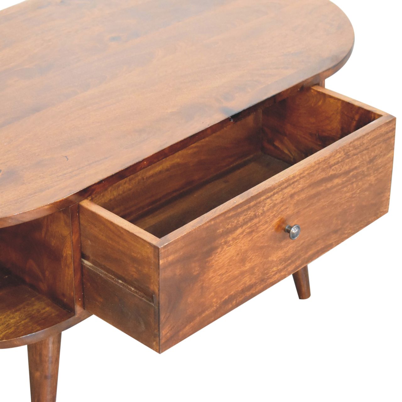 Close-up of the central drawer open with a small round handle, set within the rich wooden frame of the coffee table.