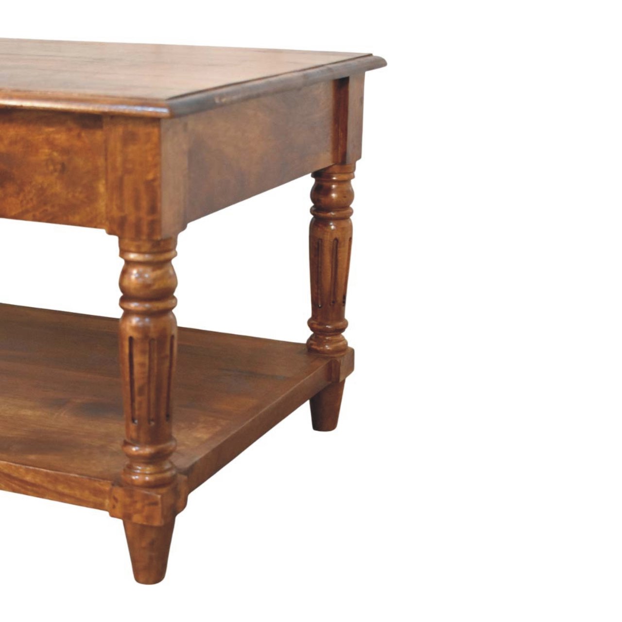 Angled corner view of a rectangular wooden coffee table highlighting the polished top, turned legs, and lower shelf for added storage space.