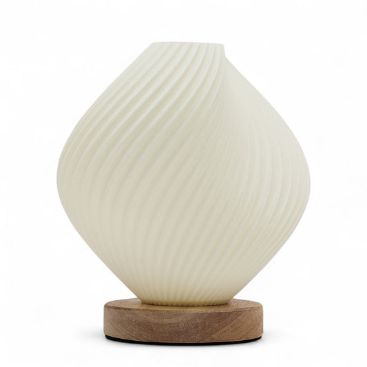 White textured table lamp with wooden base on a white background