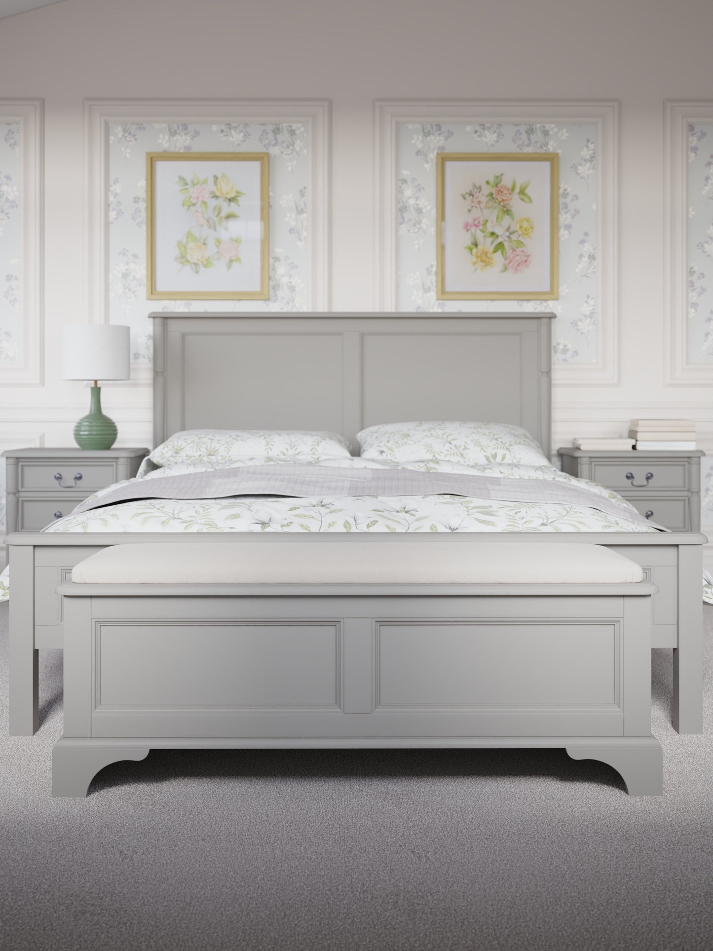A dove grey blanket box with a cushioned top and wooden body, designed for storage and seating. The blanket box is situated at the end of a bed