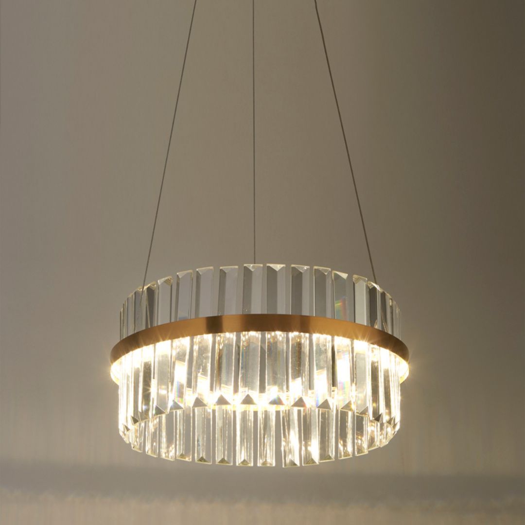 Chandelier with gold and clear design on a neutral background