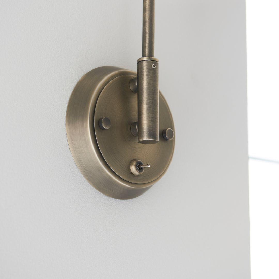 Madison Adjustable Antique Brass Wall Light - White Bear Furnishings