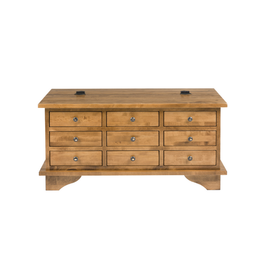 Wooden coffee table with multiple drawers on a white background