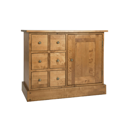 A honey-coloured wooden sideboard with one door and six drawers, with a simple traditional design.