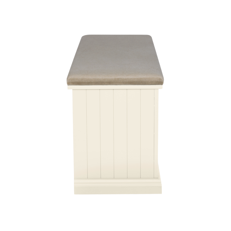 A side view of a white shoe storage bench with multiple compartments and a cushioned seat on a plain background.