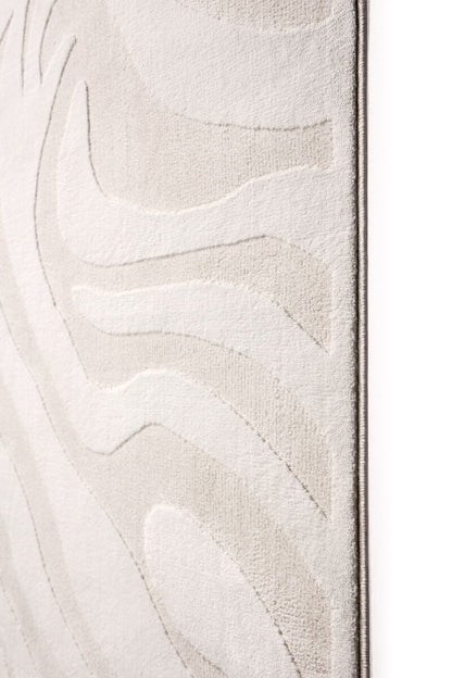 Close-up of a textured white surface with abstract patterns