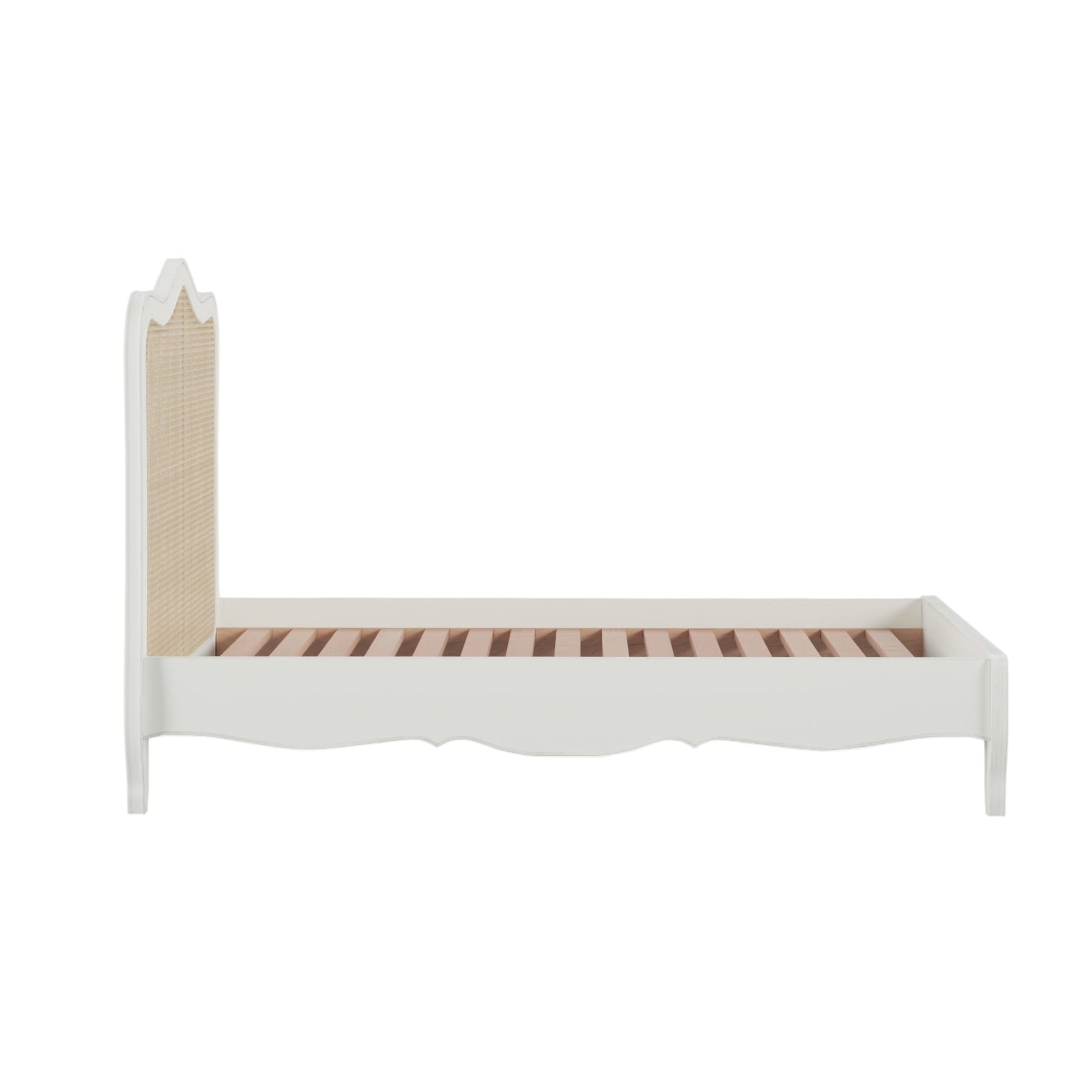 White bed frame with wooden headboard on a light pink background
