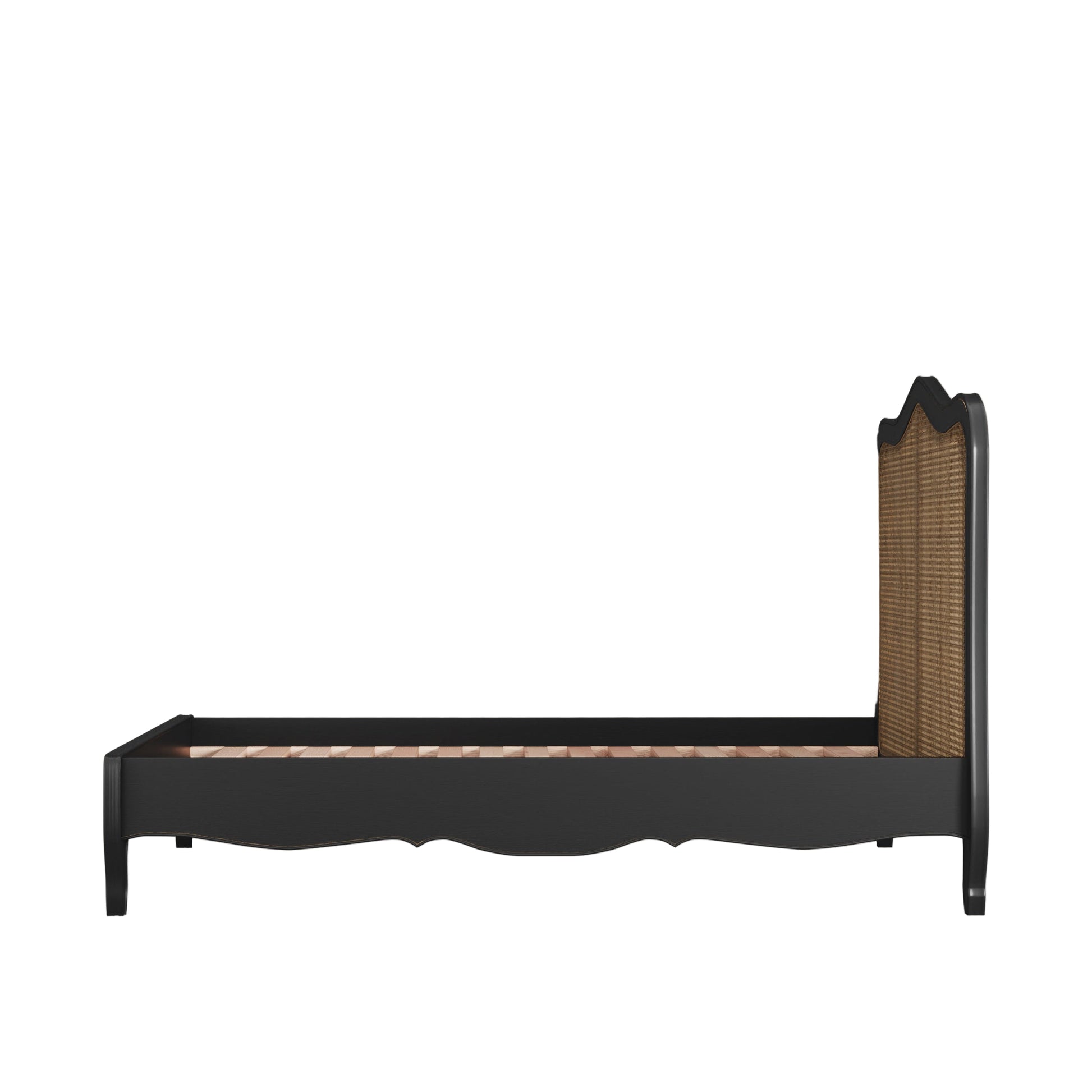Black bed frame with wicker headboard on a beige background