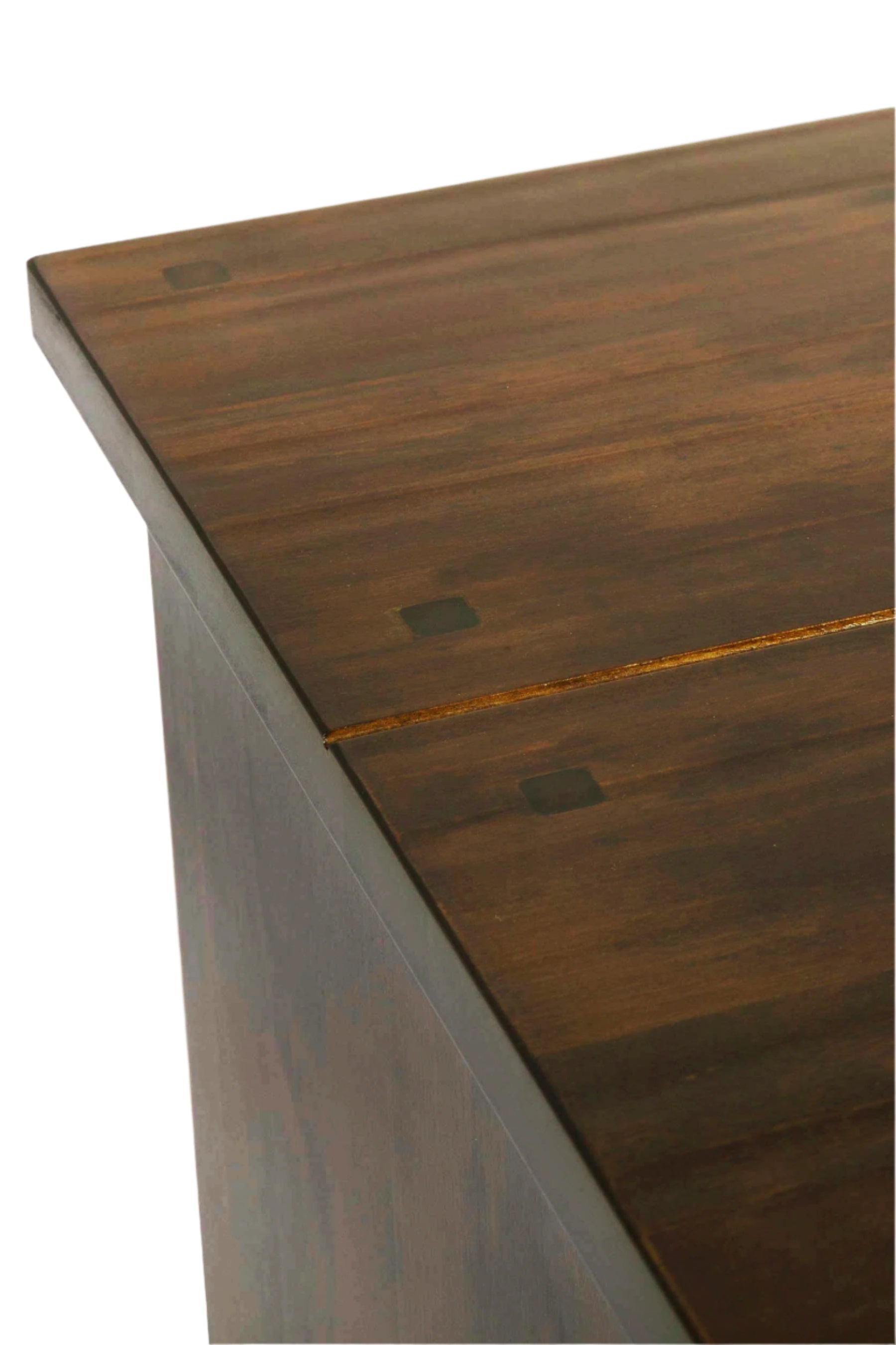 Close-up of a wooden surface with visible grain and knot details.