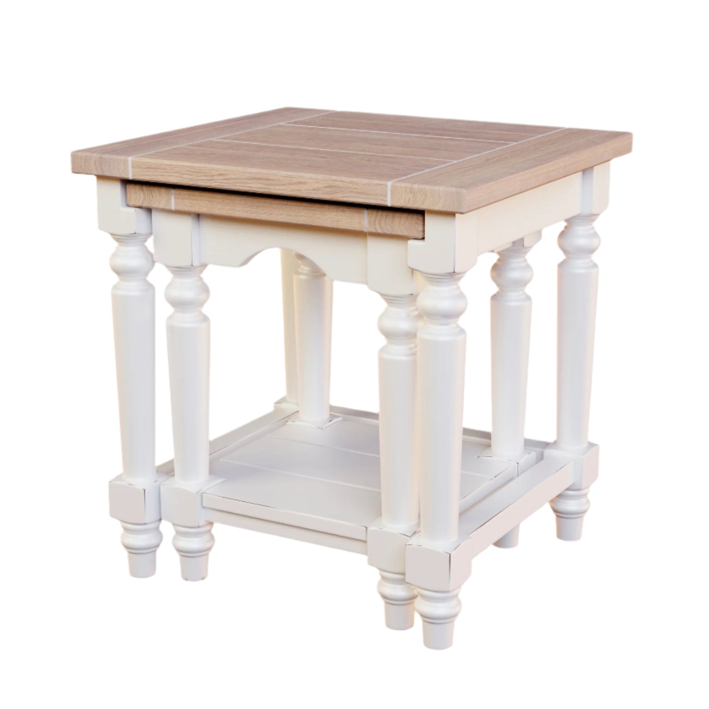 A white and brown nest of two tables with a wooden top and carved legs against a white background