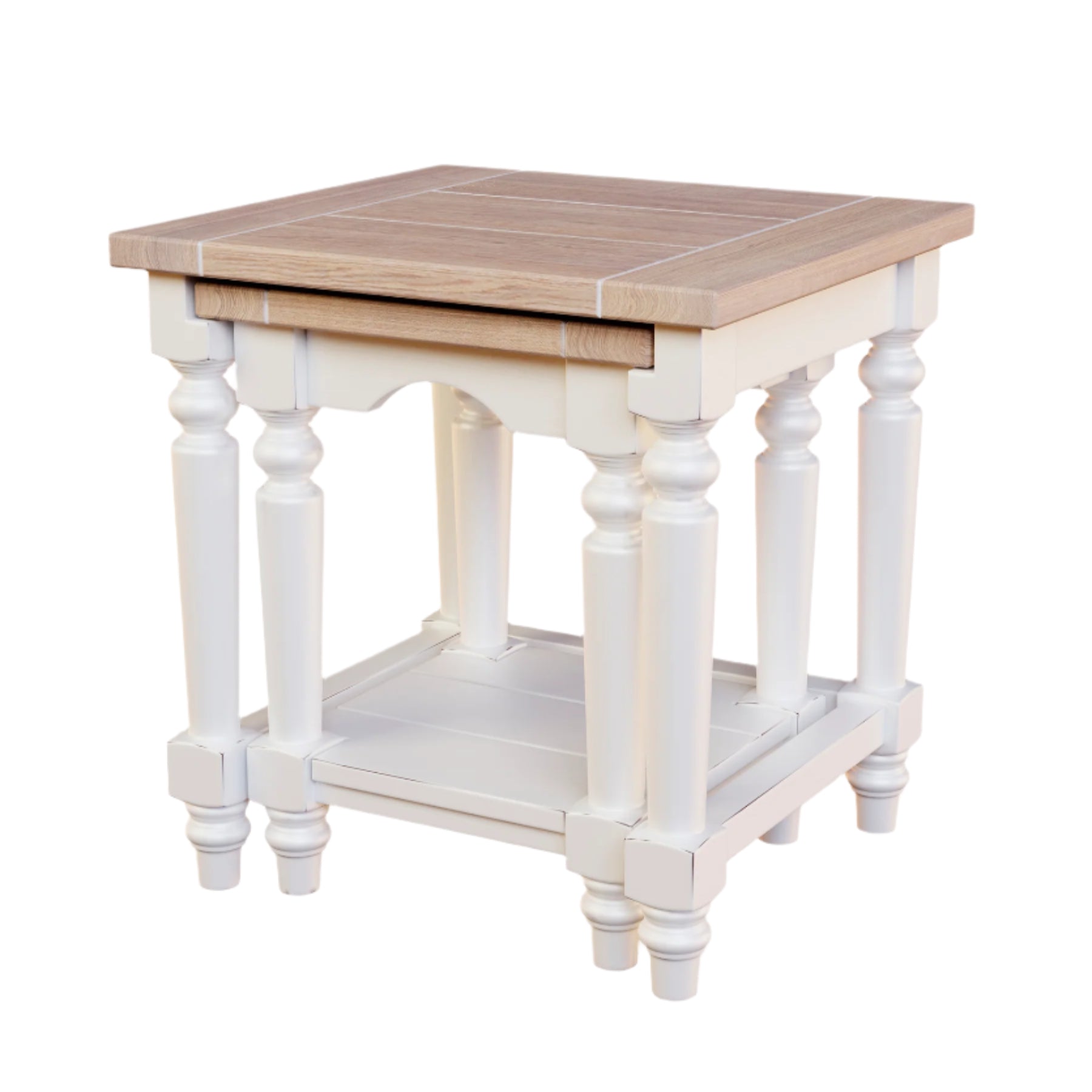 A white and brown nest of two tables with a wooden top and carved legs against a white background