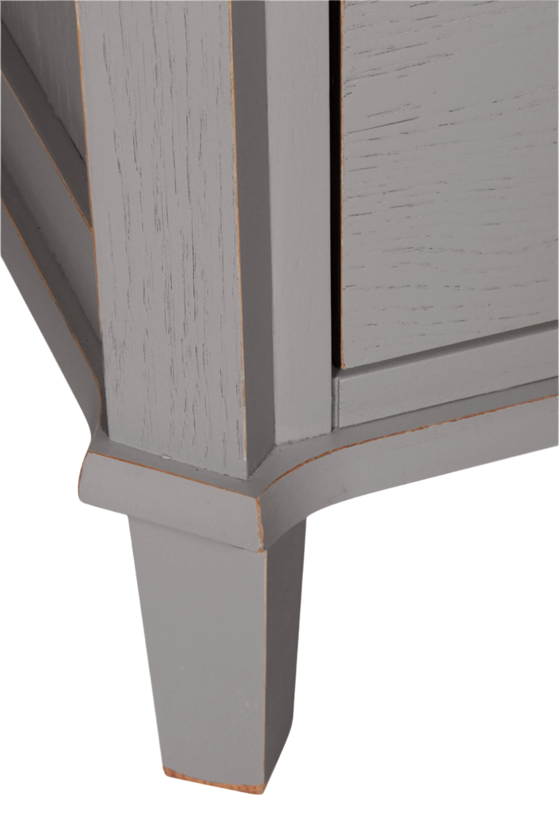 Close-up of a gray wooden cabinet corner on a white background