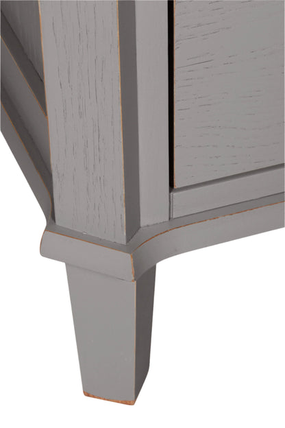 Close-up of a gray wooden cabinet corner on a white background