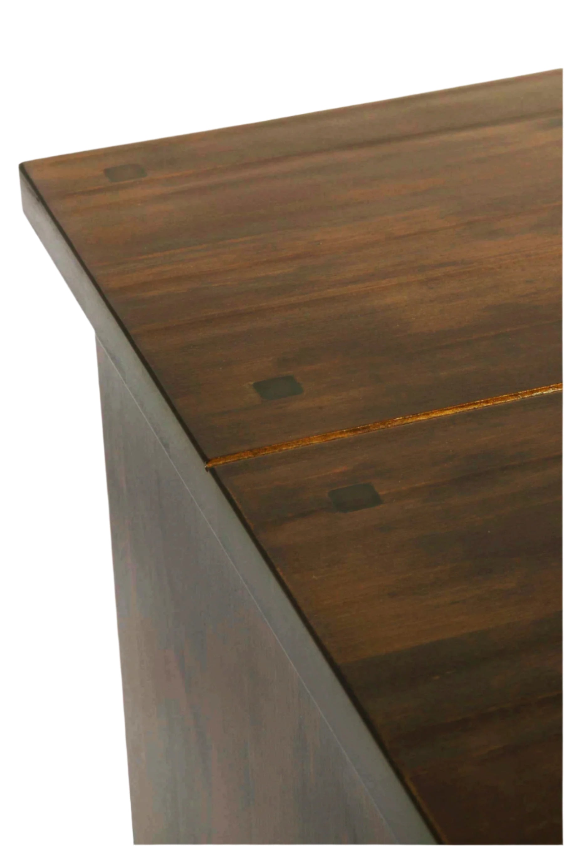 Close-up of a wooden surface with a visible grain pattern.
