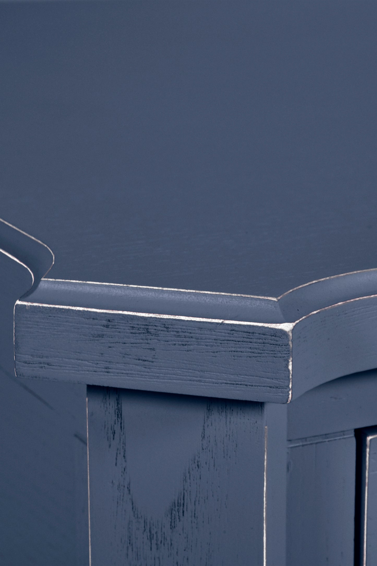 Close-up of a blue wooden surface with a smooth finish