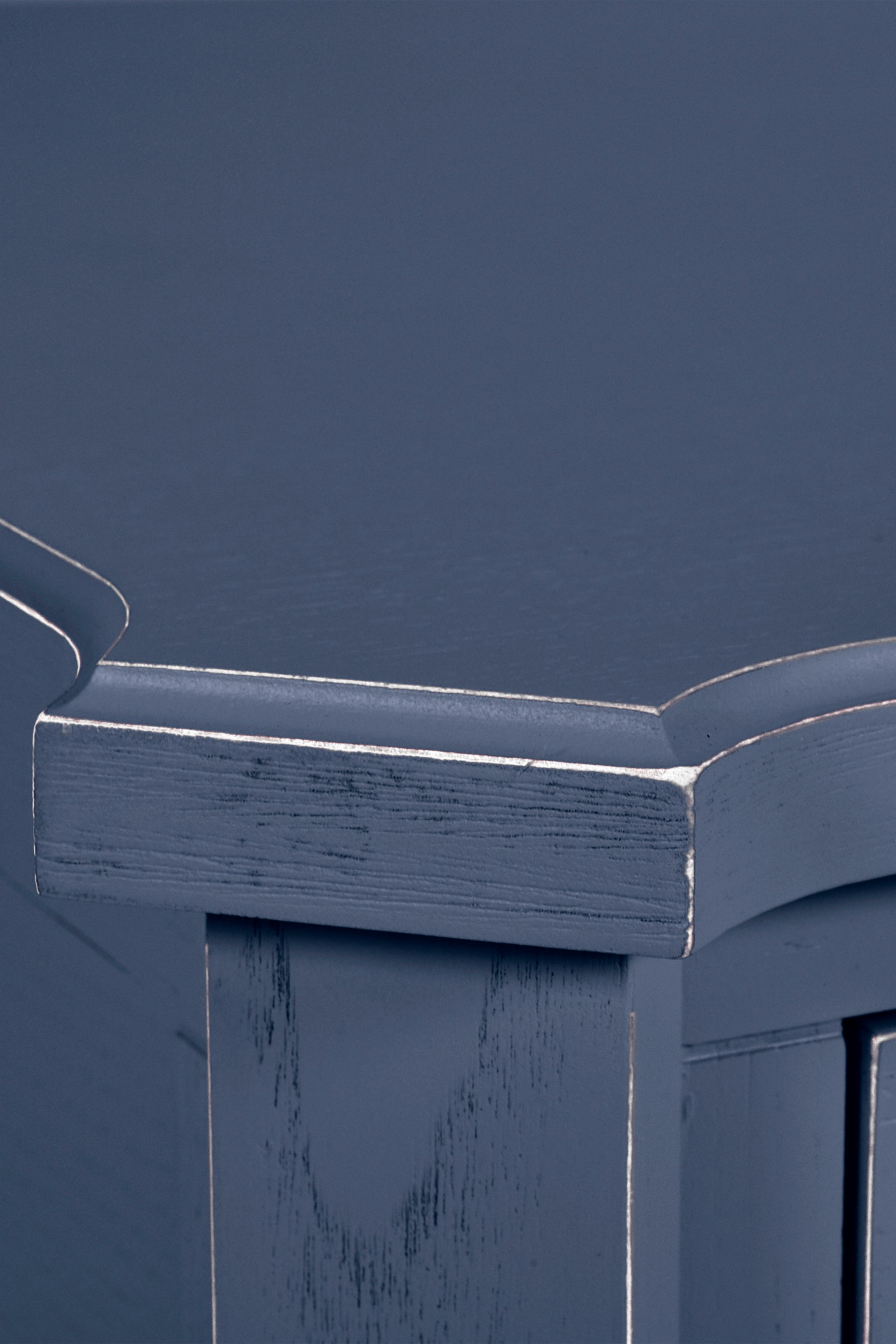 Close-up of a blue wooden surface with a smooth finish
