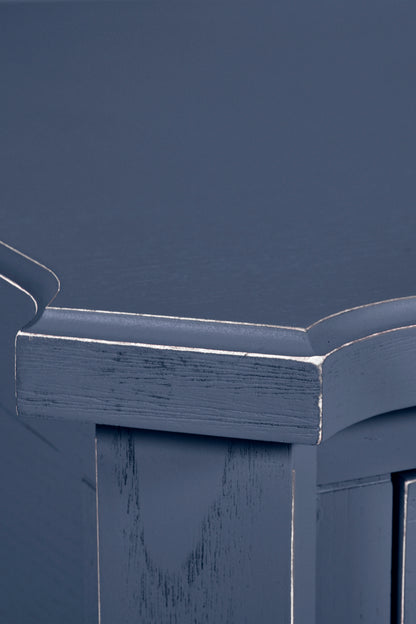 Close-up of a blue wooden surface with a smooth finish