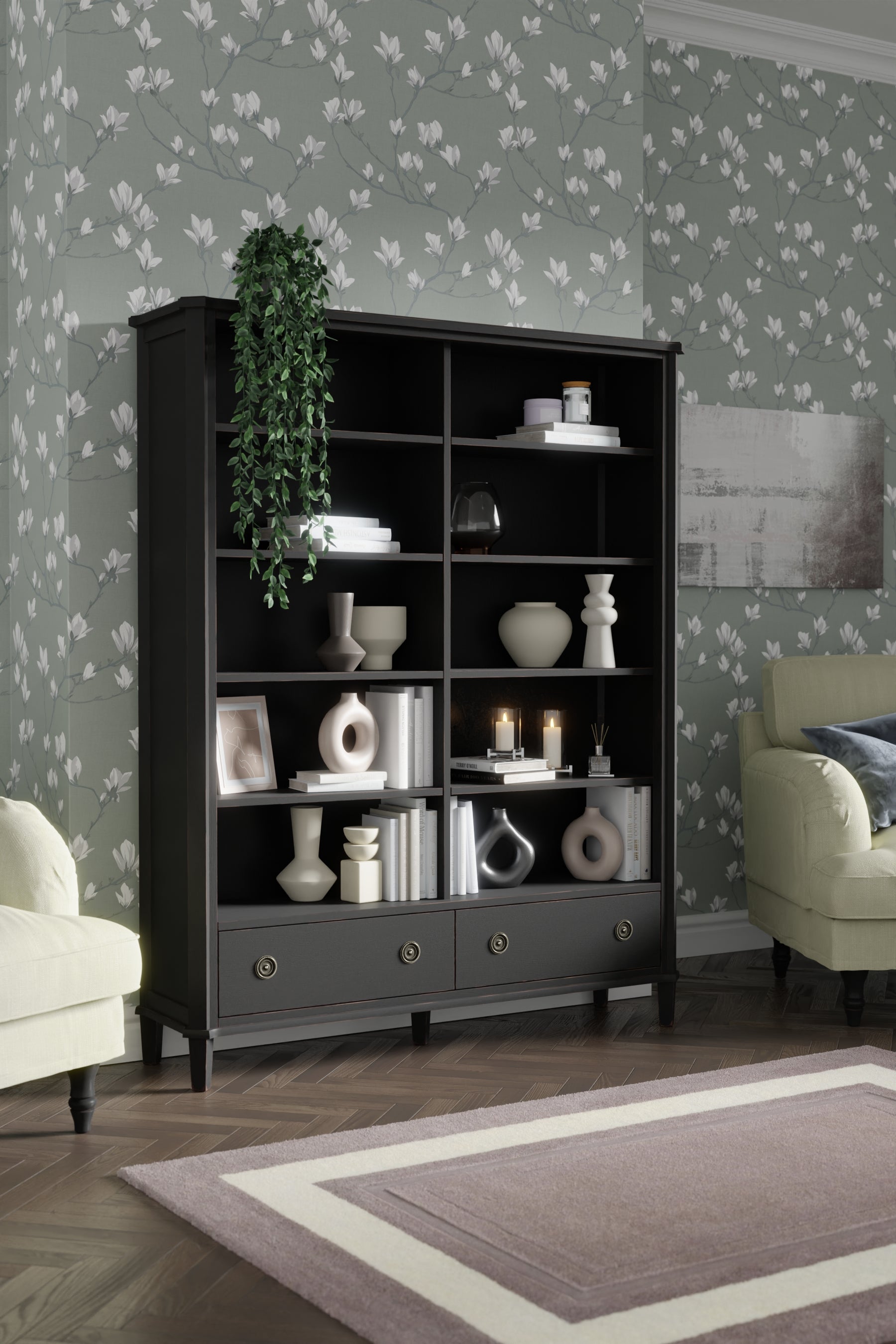 Black wooden bookcase with decorative items against a floral wallpapered wall.