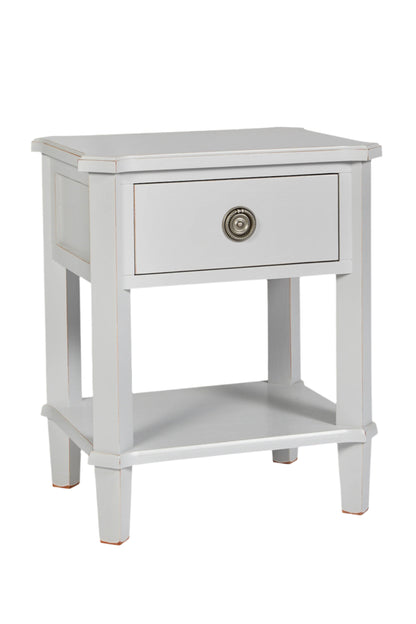 White side table with a drawer on a white background