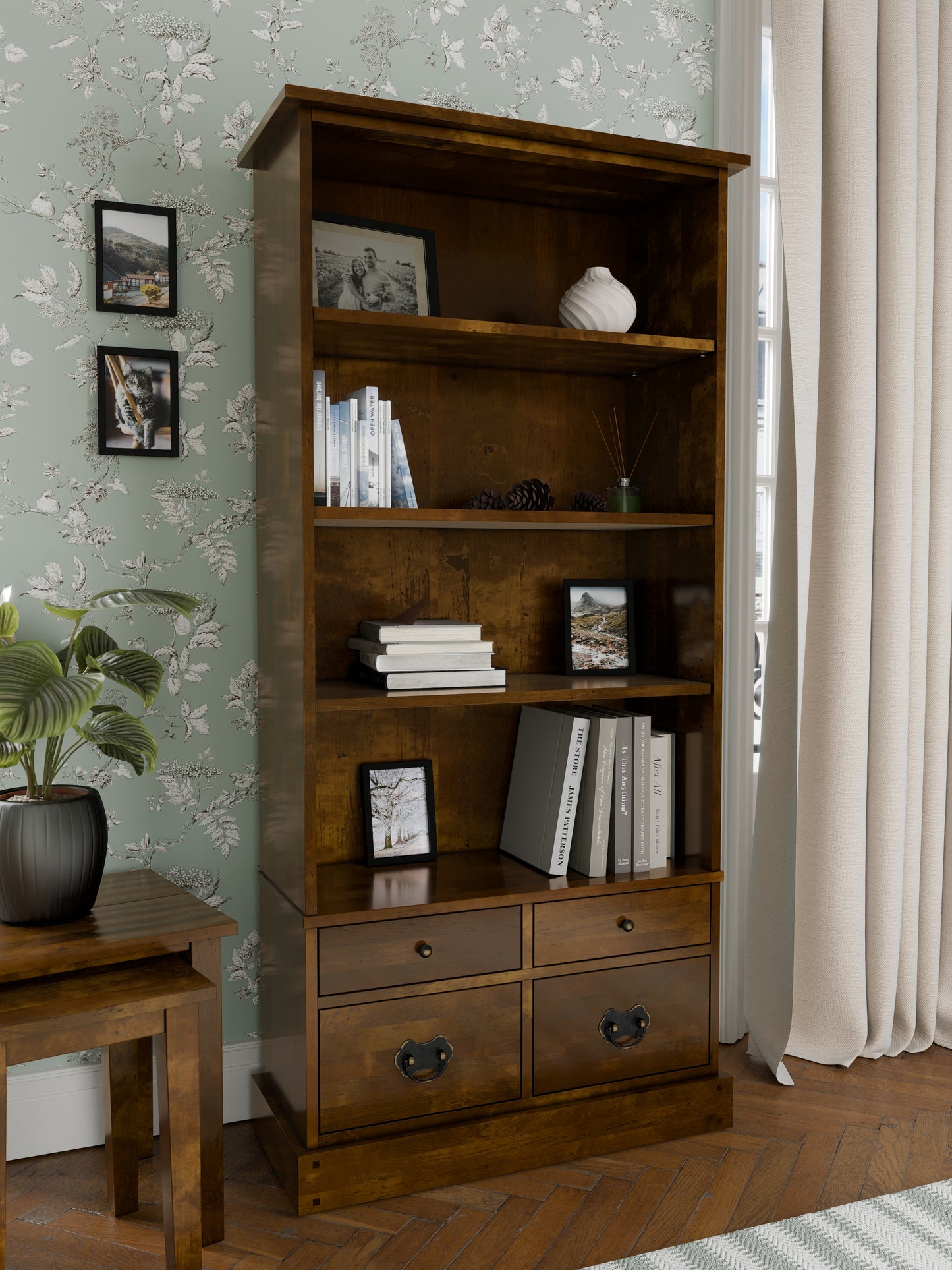Wooden bookshelf with shelves and drawers in a room setting.