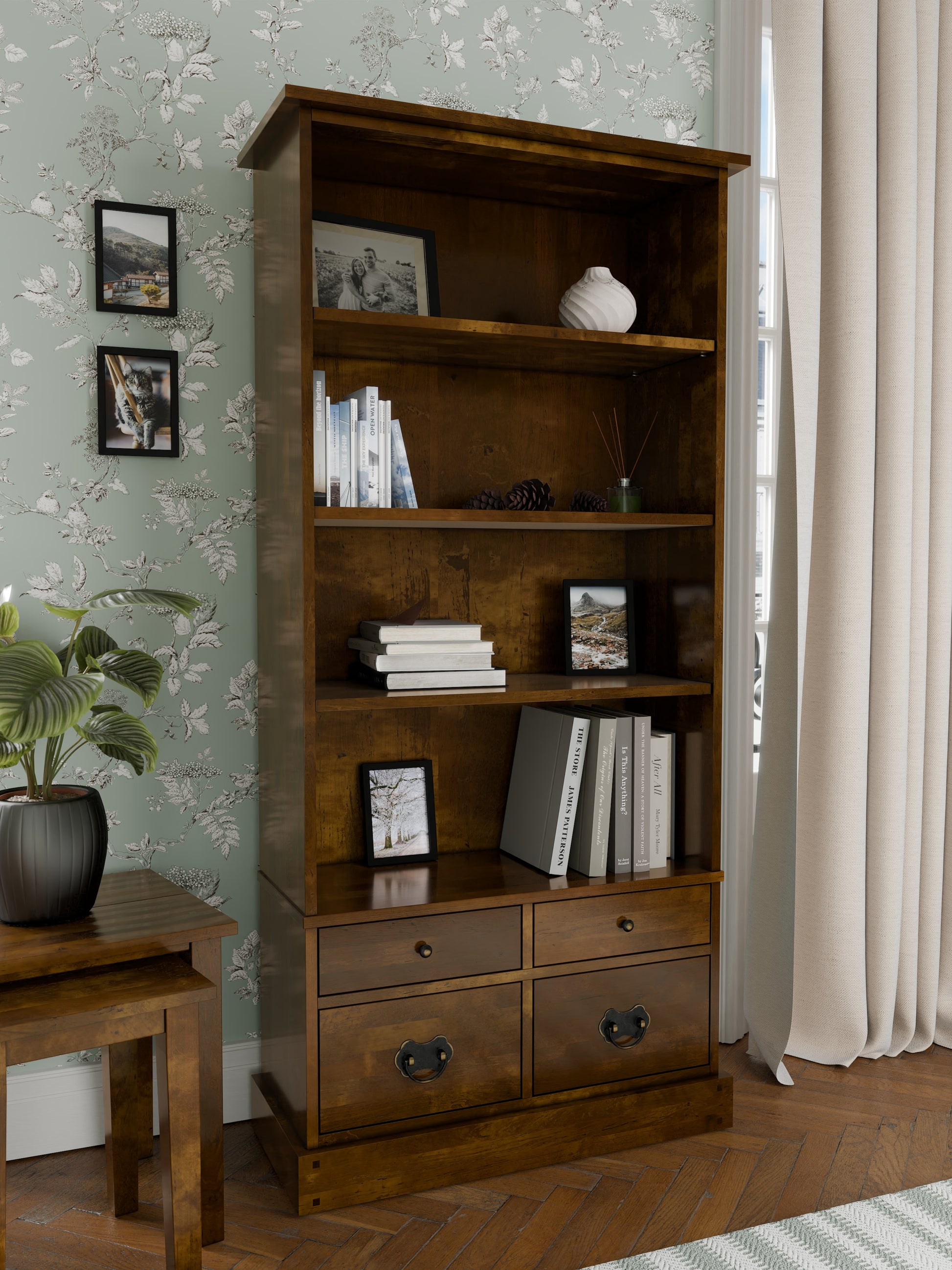 Wooden bookshelf with shelves and drawers in a room setting.