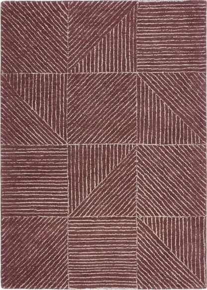 Patterned rug with geometric design in brown and beige tones