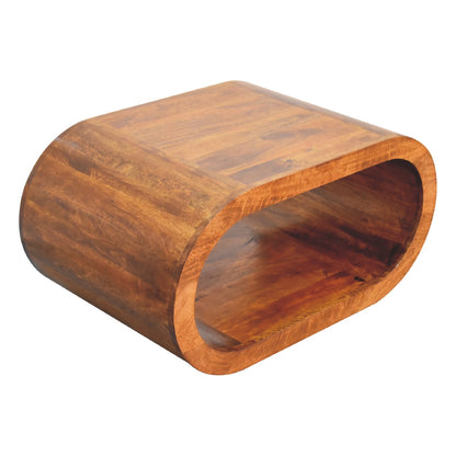 Top view of the oval wooden table, showing the polished wood grain and flat upper surface.
