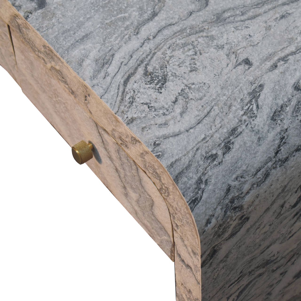 Overhead view of the right hand corner of a marble-effect coffee table with a rectangular polished surface showcasing natural stone-like veining.
