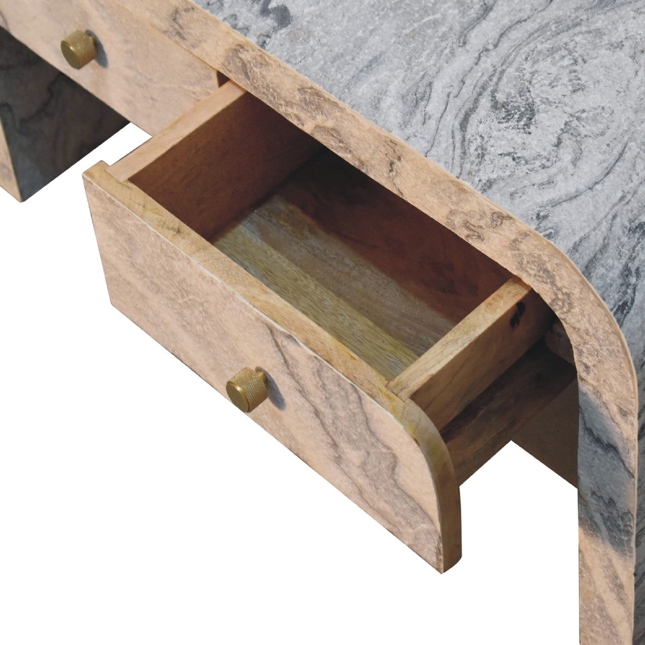 Close-up of one open drawer on a marble-effect coffee table, showing the brass round knob and detailed stone-like finish.