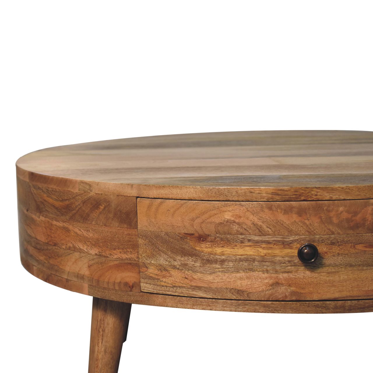 Close-up of the integrated drawer with round brass knob.
