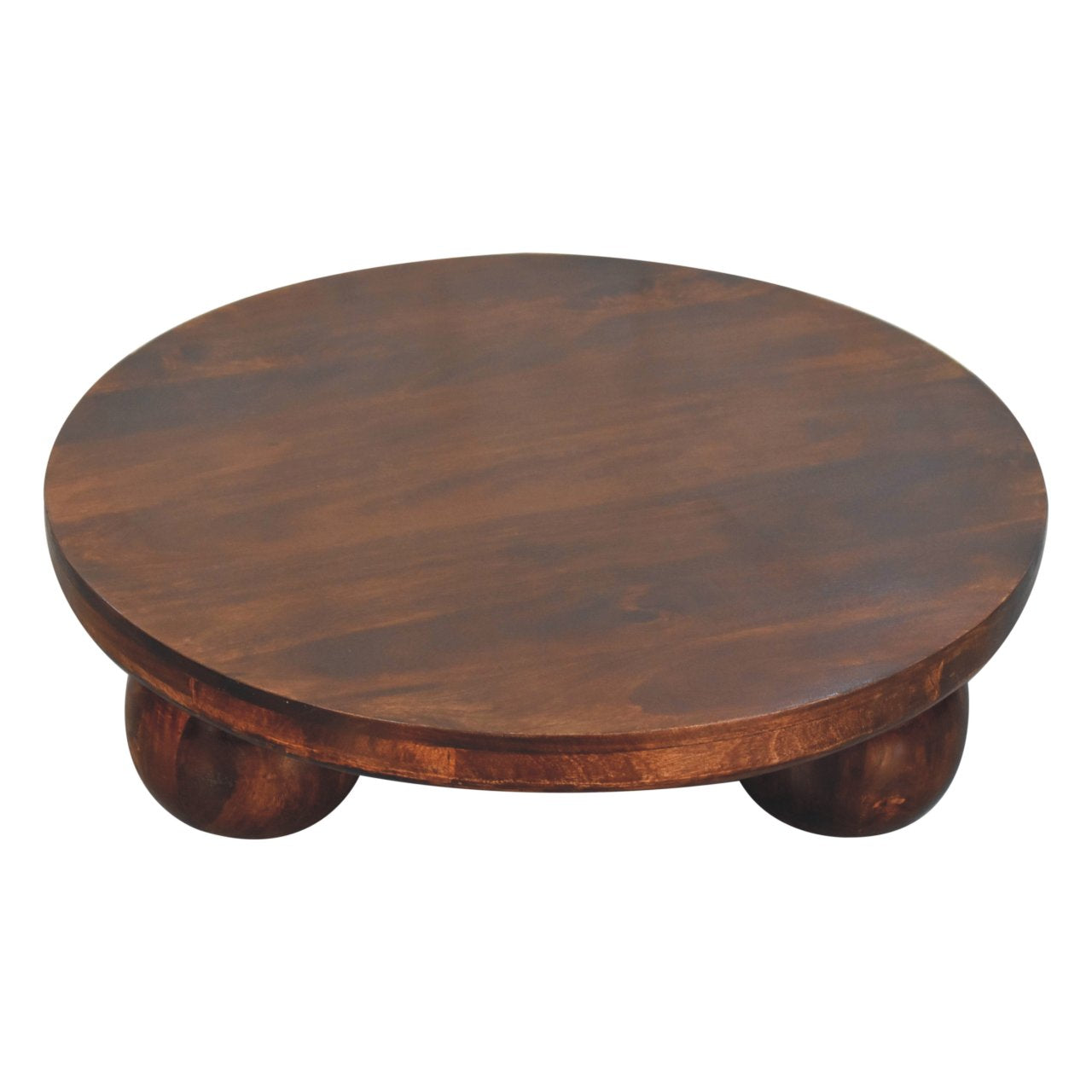 Photo taken from higher angle, round wooden coffee table with 3 spherical wooden legs against a white background