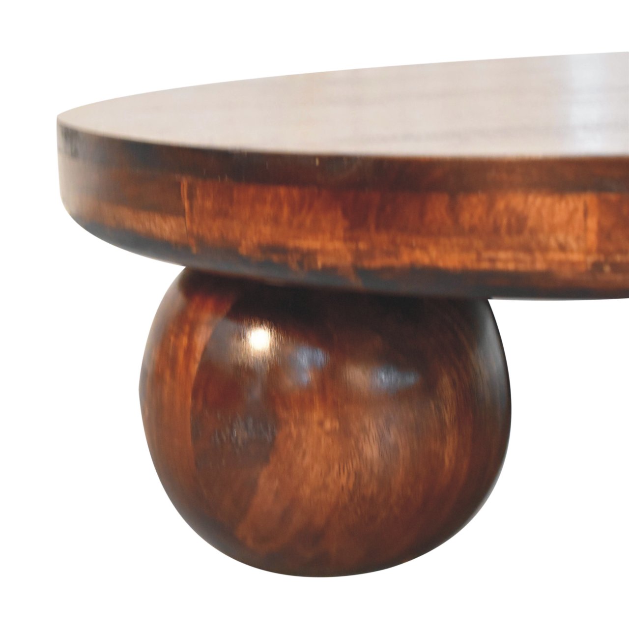 close up of wooden spherical leg of coffee table