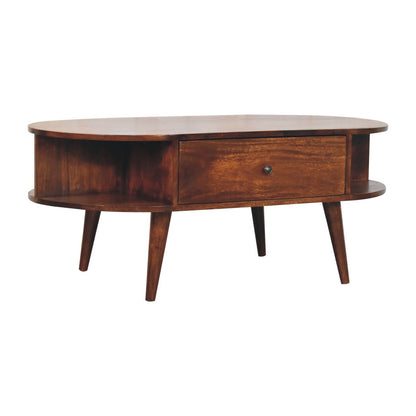 45 degree left angle from the front-facing view of the oval coffee table showing its single central drawer and open shelves on either side.