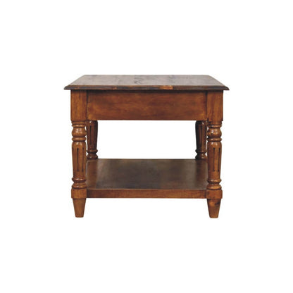 Side profile of a traditional wooden coffee table with a flat rectangular top, turned legs, and an integrated lower shelf for storage or display.