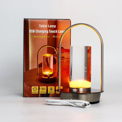 USB charging touch lamp with packaging on a light gray background