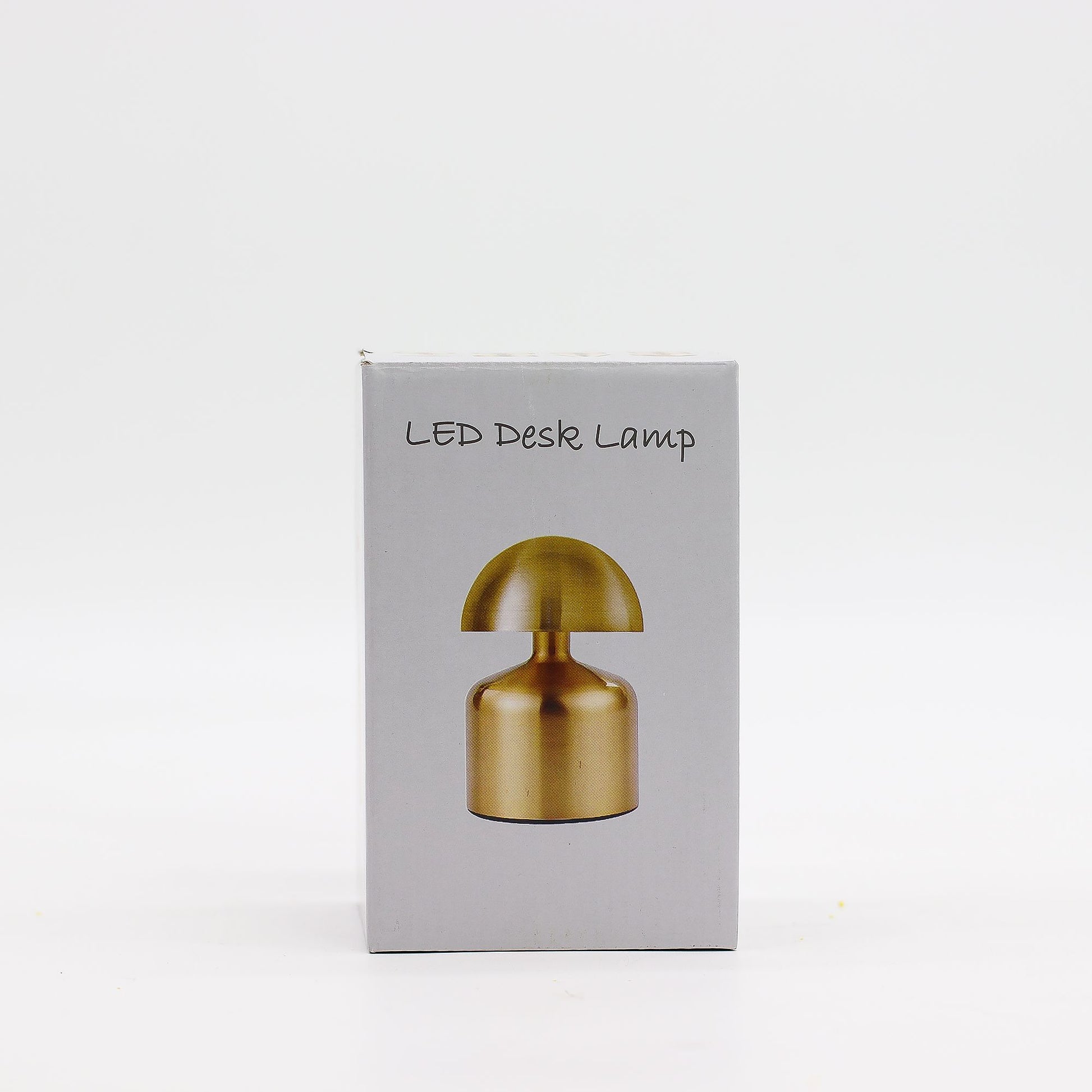 Box for LED desk lamp with gold lamp illustration on a white background