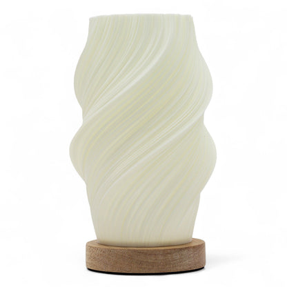 White textured vase with wooden base on a white background