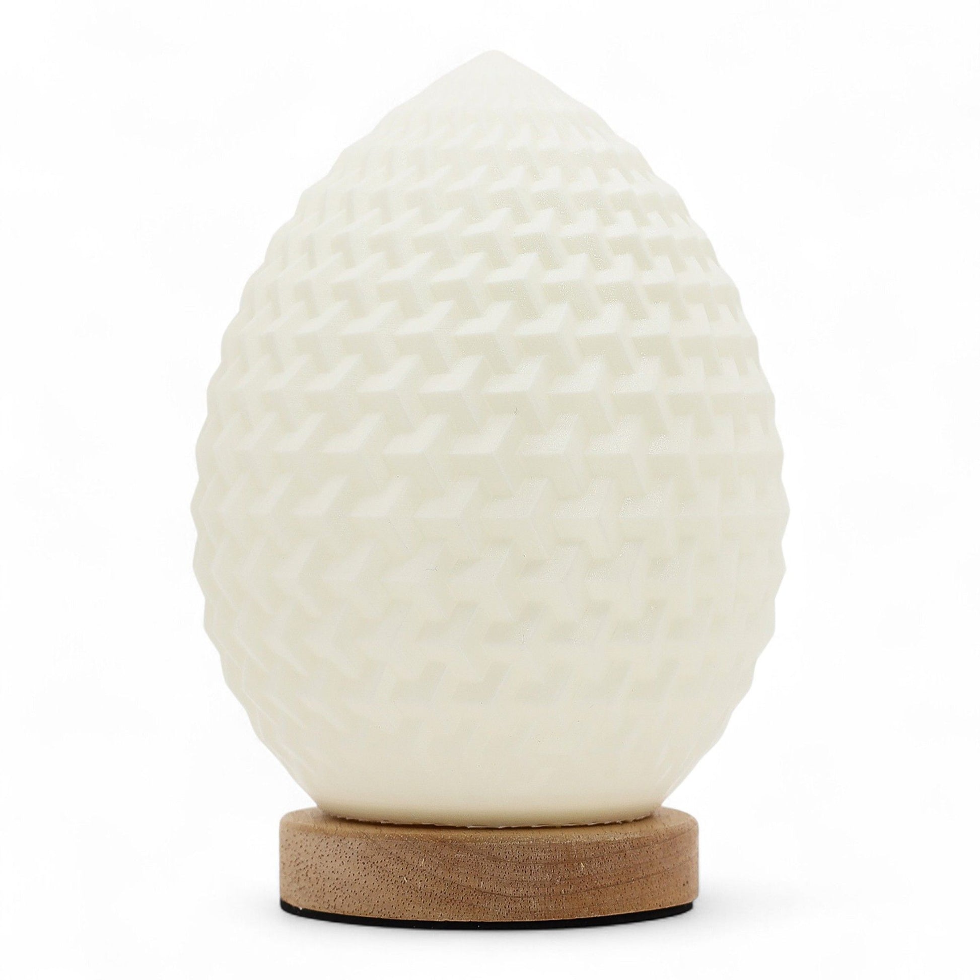 White textured lamp with wooden base on a white background