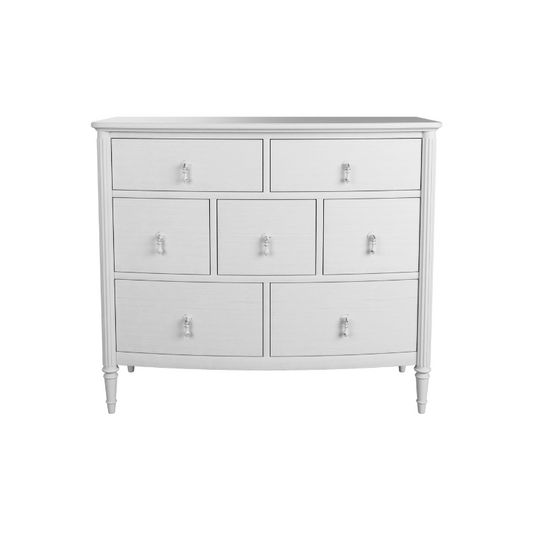 A whitewashed oak chest of drawers with a simple traditional design and metal handles.