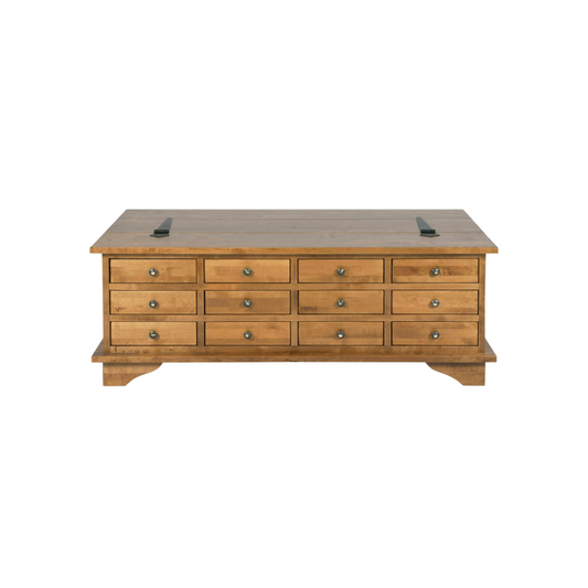 A honey-colored wooden coffee table with 12 drawers, positioned in a living room setting.
