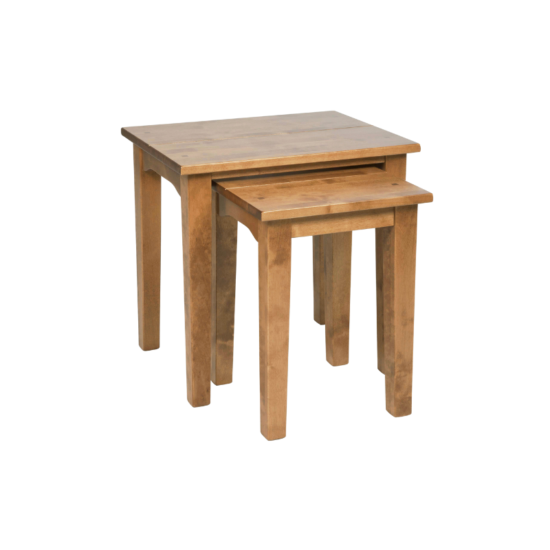 A set of two nesting tables in a honey oak finish, with the larger table on top of the smaller one.